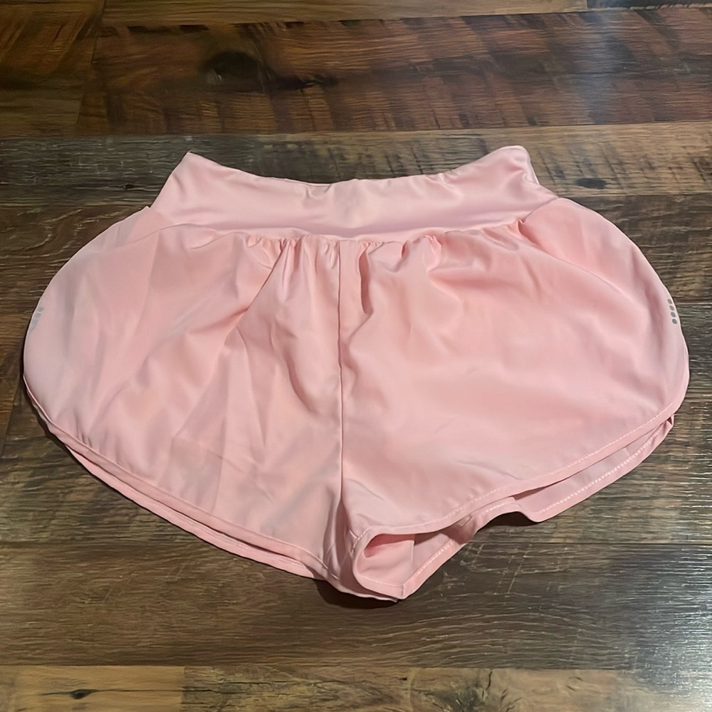 Adult small, light pink shorts with under shorts (including pockets)